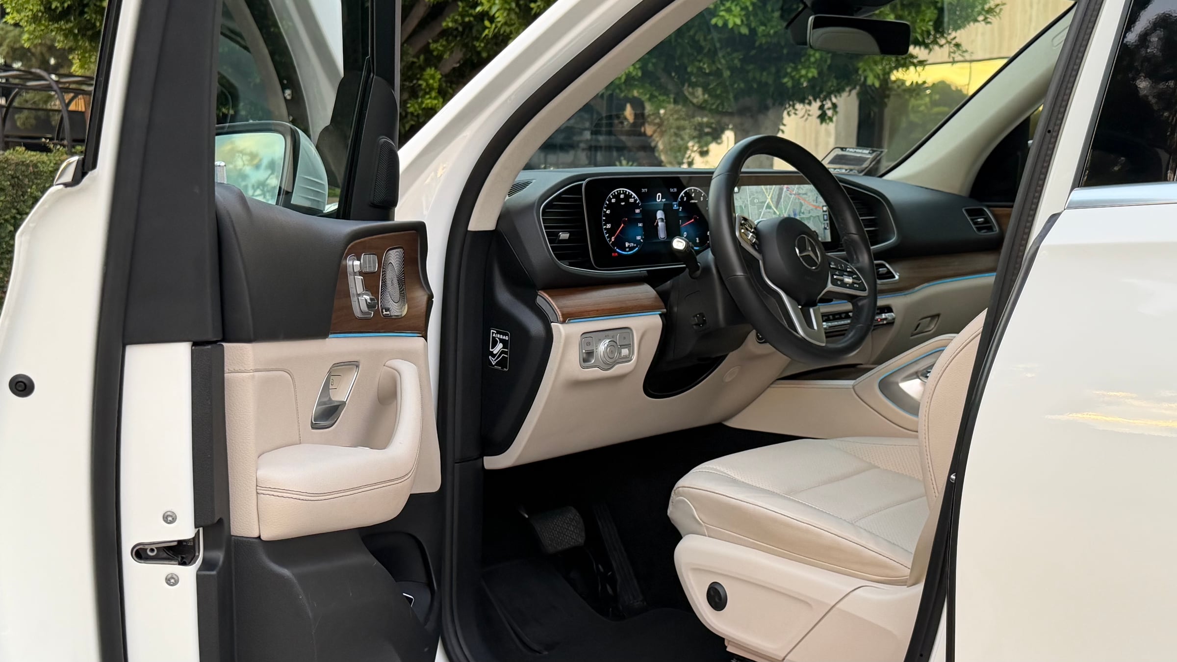 White Mercedes-Benz GLE 350 driver cabin with premium interior